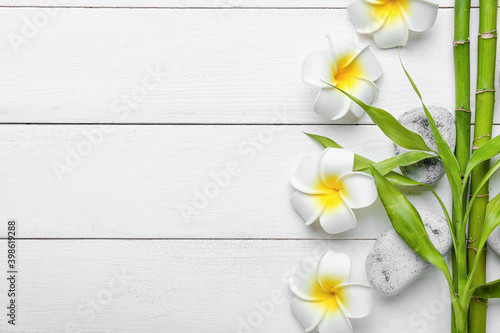 Canvas Print Beautiful spa composition with flowers on light wooden background