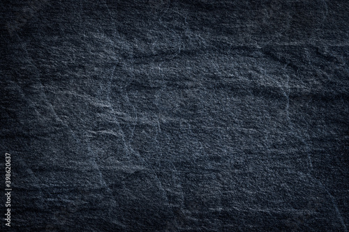 Dark grey stone / black slate stone background or texture