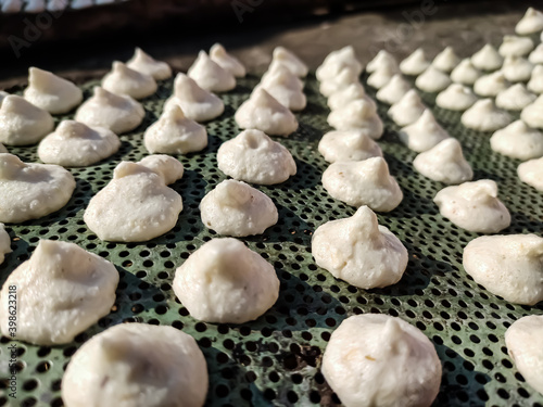 Bori is a form of dried lentil dumplings popular in Bengali cuisine. It is made from a paste of urad dal and winter melon which is sun-dried for 3–5 days.