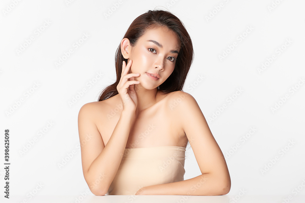Beautiful Young asian Woman with Clean Fresh Skin, on Pink background, Face care, Facial treatment. Cosmetology, beauty and spa. Asian women portrait Beautiful Young asian Woman with Clean Fresh Skin, on Pink background, Face care, Facial treatment. Cosmetology, beauty and spa. Asian women portrait