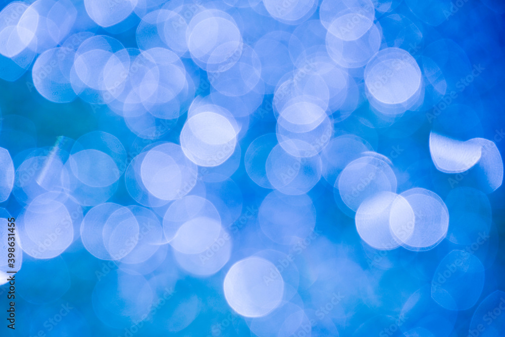 Blue bokeh abstract background. blue bokeh lights abstract background. Bokeh on the background blurred the natural blue and white. Blue bokeh abstract background. blue bokeh lights abstract background. Bokeh on the background blurred the natural blue and white.