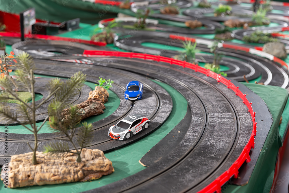 Racing car on the toy race track. High quality photo