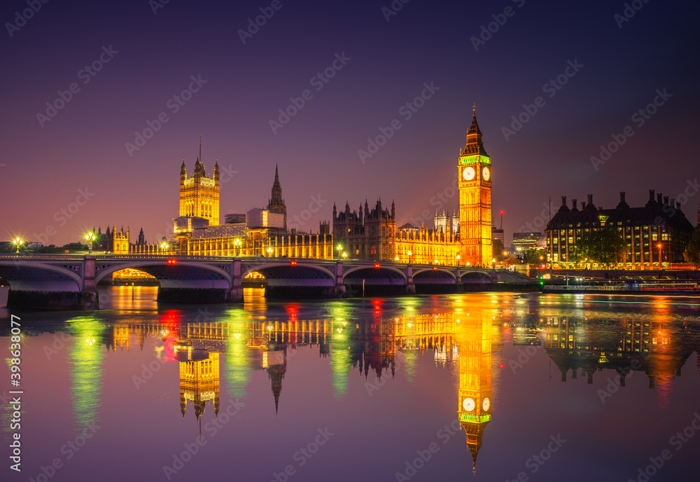 Big Ben and Westminster with reflection at night in London. England