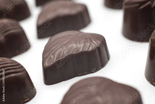 Closeup of chocolate collection on white background