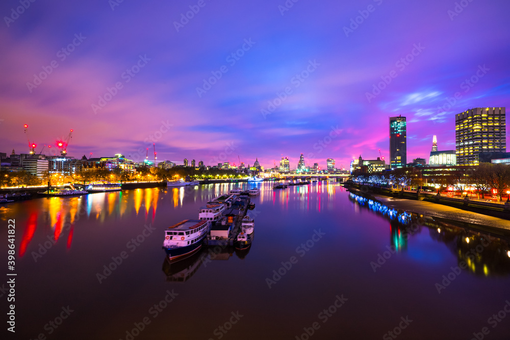 Southbank of river Thames in London at sunrise. England