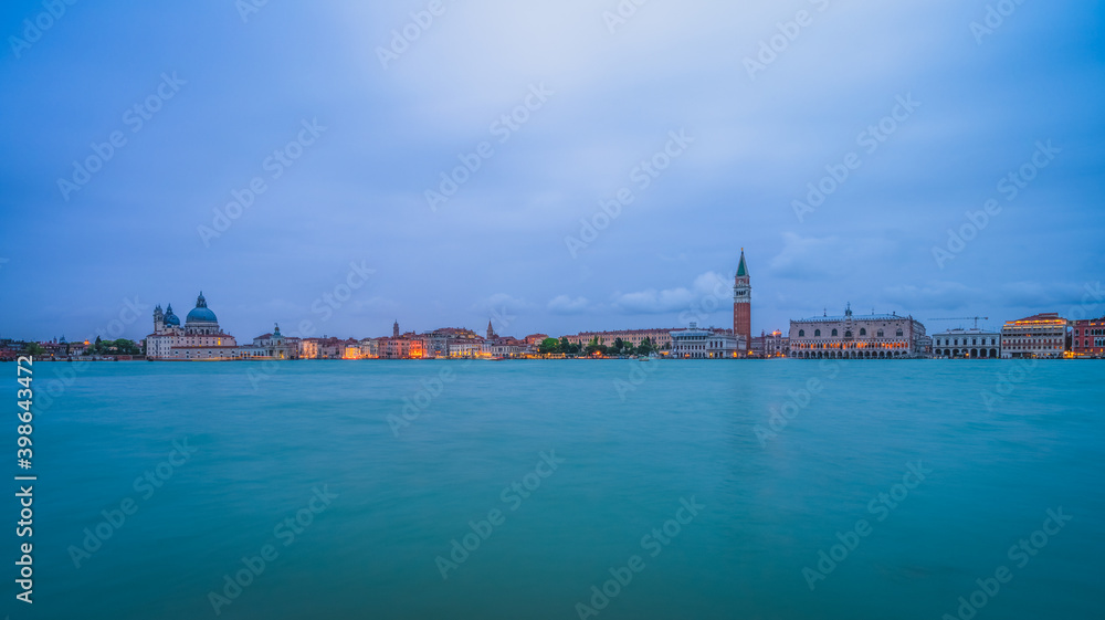 Venice cityscape waterfront view at dawn. Italy