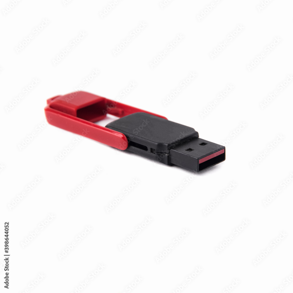 Red and black plastic USB flash drive isolated on white background Red and black plastic USB flash drive isolated on white background