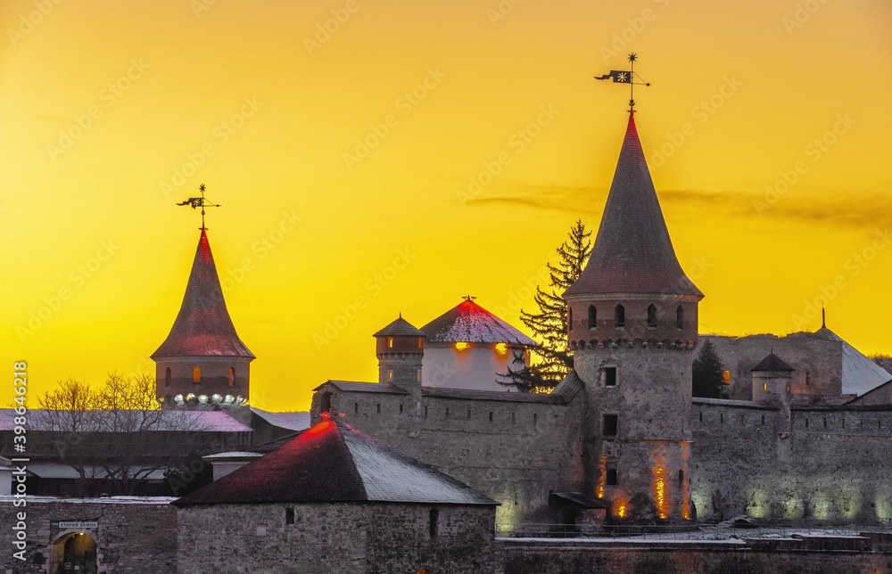 Kamianets-Podilskyi fortress on a winter night