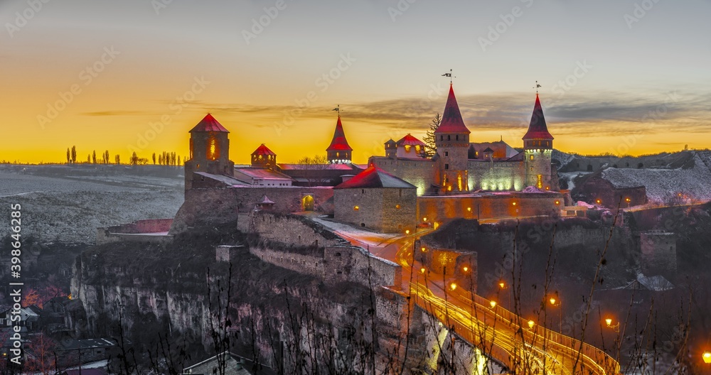 Kamianets-Podilskyi fortress on a winter night