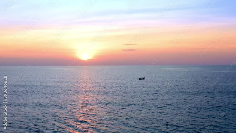 4K Beautiful tropical beach with sunset sky. Beautiful Phuket beach is famous tourist destination at Andaman sea summer concept. Areal drone view tropical beach with sunset over the sea 4K Beautiful tropical beach with sunset sky. Beautiful Phuket beach is famous tourist destination at Andaman sea summer concept. Areal drone view tropical beach with sunset over the sea