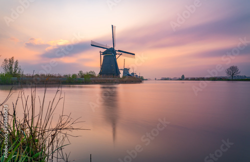 Traditional dutch windmill at sunset