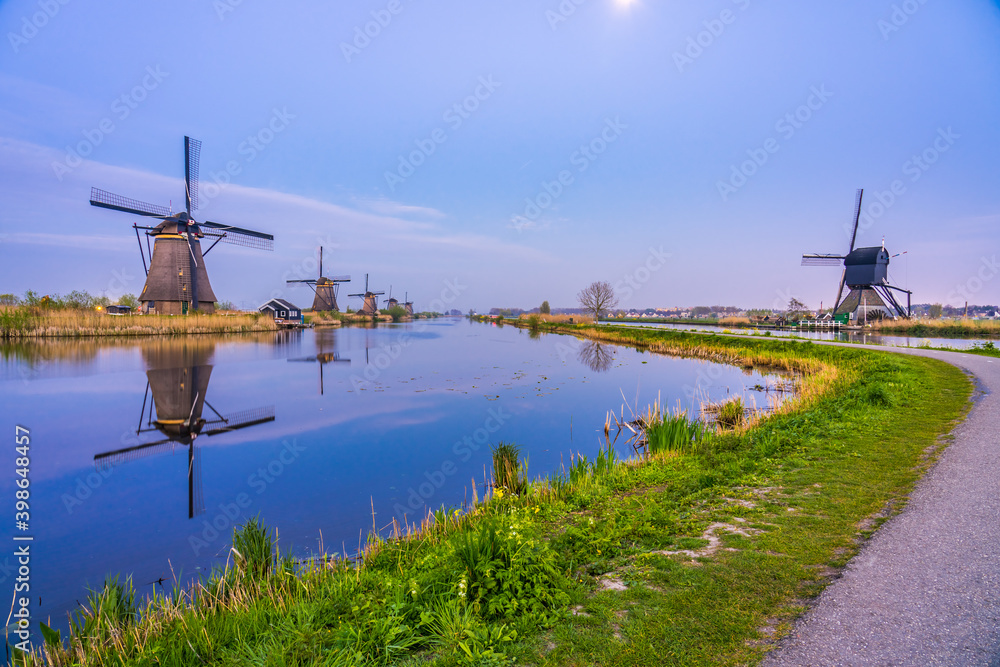 Traditional dutch windmill at sunset