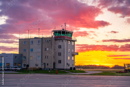 Canvas Print Air traffic control tower at beautiful sunset