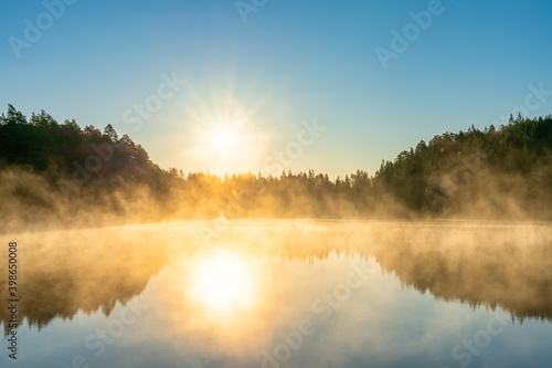 Sunrsise at the lake with morning fog