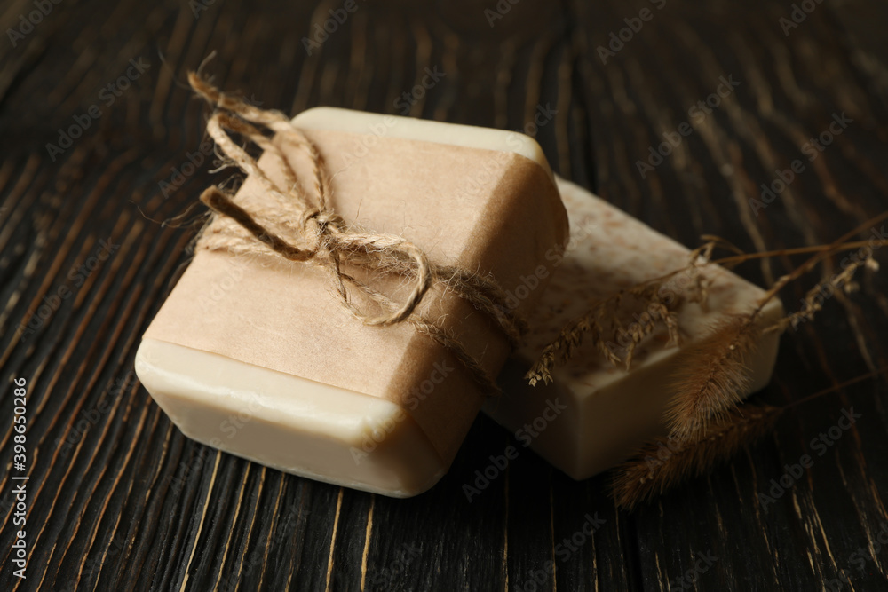 Pieces of natural handmade soap on wooden background Pieces of natural handmade soap on wooden background