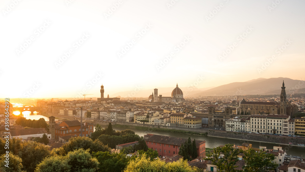 Sunset landscapes over Arno River with Florence city skyline at golden time