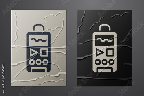 White Dictaphone icon isolated on crumpled paper background. Voice recorder. Paper art style. Vector.