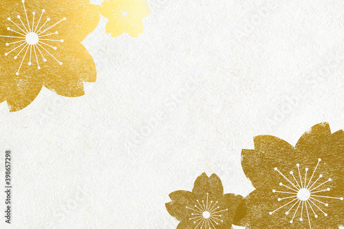 Background image of gold cherry blossom petals on white Japanese paper