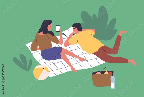 Young couple lying on blanket in park together and enjoying summer picnic. Scene of recreation and leisure outdoors. Flat vector cartoon illustration of cute family relaxing and reading