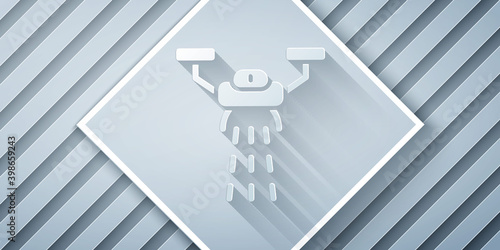 Paper cut Smart farm with drone control for seed planting icon isolated on grey background. Innovation technology for agricultural company. Paper art style. Vector.