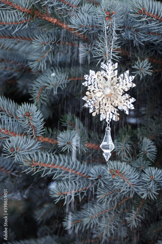 snowflake hanging on a branch  Christmas toy  festive mood  family traditions  ussr  new year tree  blue spruce