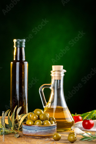 Fototapeta Naklejka Na Ścianę i Meble -  Olives and olive oil in studio