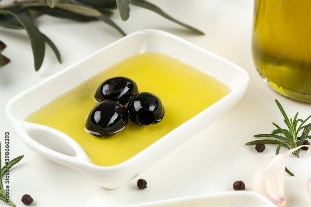 Olives and olive oil in studio