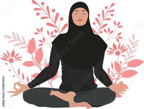 A girl in a hijab is engaged in yoga. Muslim woman sits in lotus on the floral background 