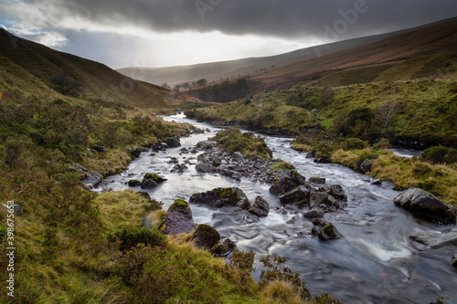 Rainclouds over the river Tawe in the Brecon Beacons in South Wales UK 