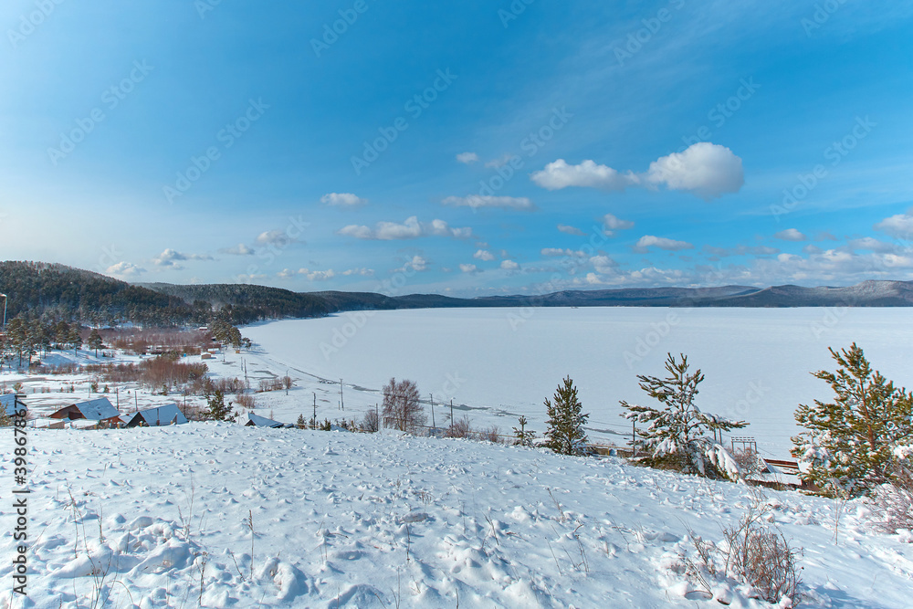 A view of the lake Turgoyak in the winter. Chelyabinsk region, Miass city A view of the lake Turgoyak in the winter. Chelyabinsk region, Miass city