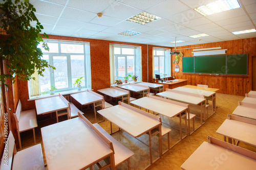 Interior of an empty school classroom. Concept of coronavirus COVID-19 quarantine in schools and educational institutions