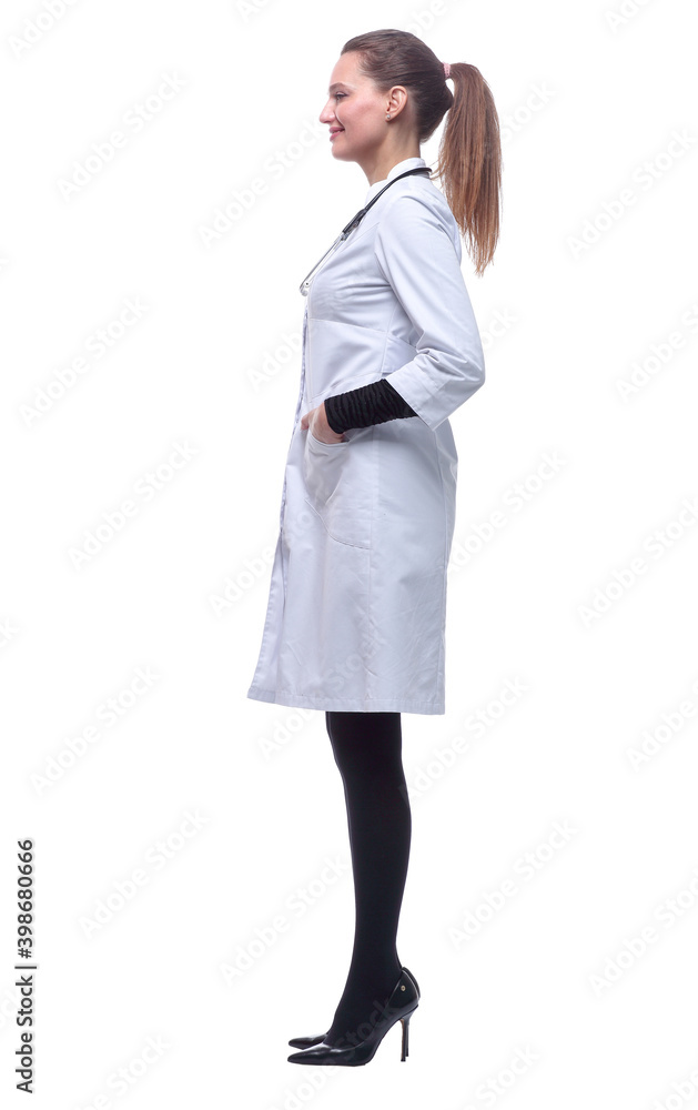 side view. young woman doctor looking at a white screen. side view. young woman doctor looking at a white screen.
