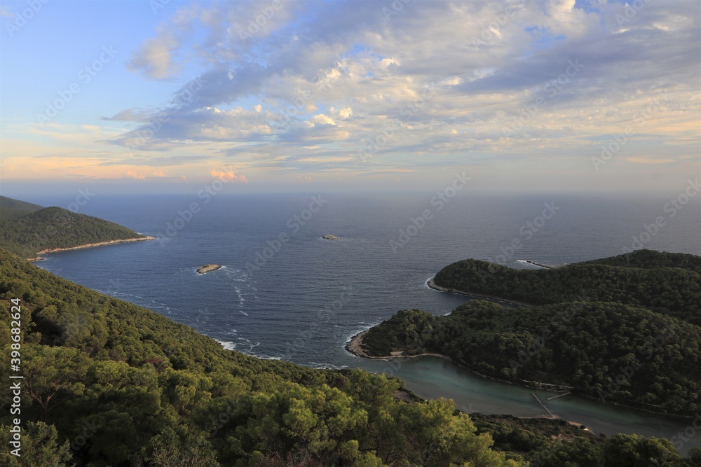 Fantastic view from the Montekuc viewpoint to green wooded slopes by the Adriatic Sea at the Mljet national park.