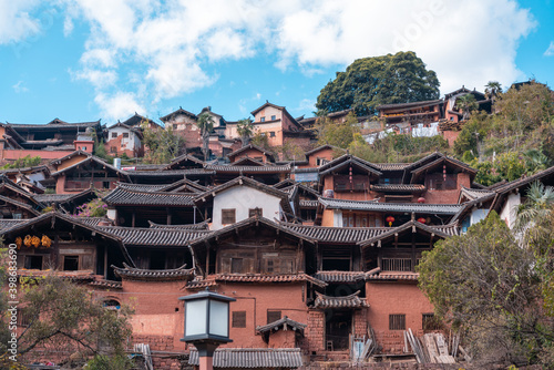 chinese tradintional house in village with blue sky and clous