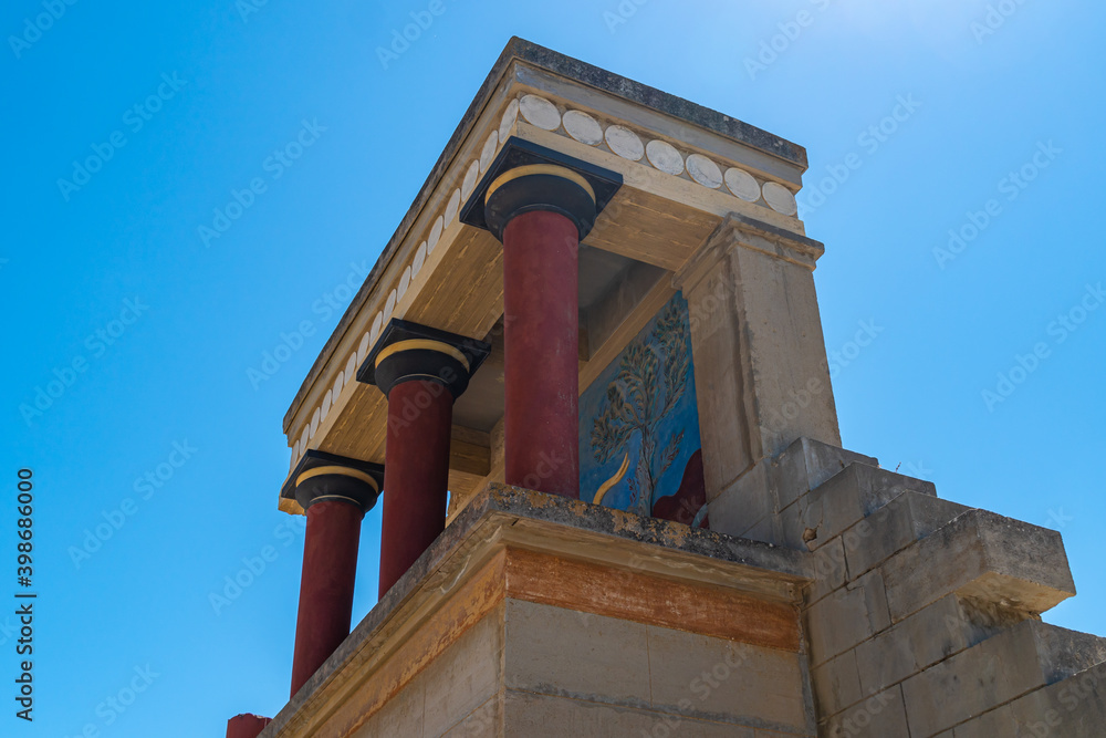 Old walls of Knossos near Heraklion. Detail of ancient ruins ruins of the Minoan palaces - largest archaeological site of all the palaces in Mediterranean island of Crete, UNESCO list, Greece