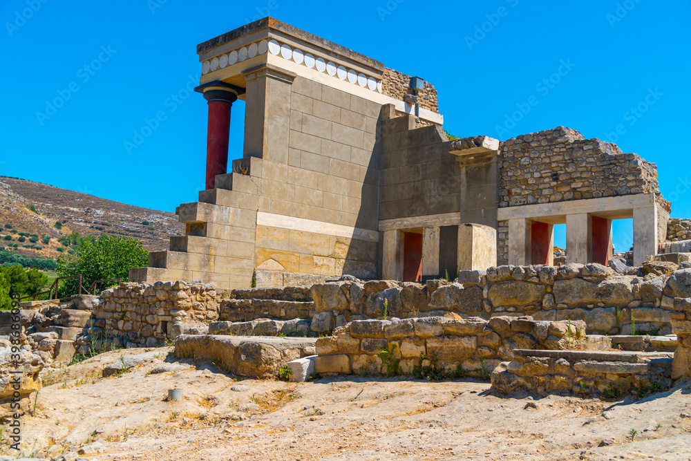 Old walls of Knossos near Heraklion. Detail of ancient ruins ruins of the Minoan palaces - largest archaeological site of all the palaces in Mediterranean island of Crete, UNESCO list, Greece