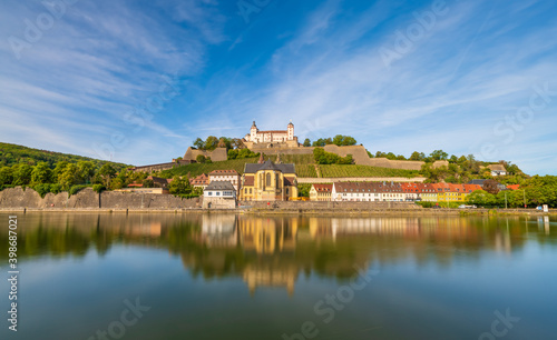 Marienberg Fortress reflecting in the river Main.colorful sunset. Wurzburg, Bavaria, Germany