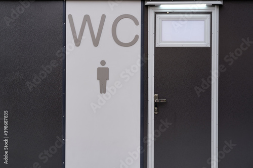 Entrance to the men's toilet. Space for lettering or design