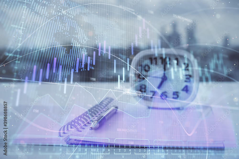 Multi exposure of financial graph drawings and desk with open notebook background. Concept of forex Multi exposure of financial graph drawings and desk with open notebook background. Concept of forex