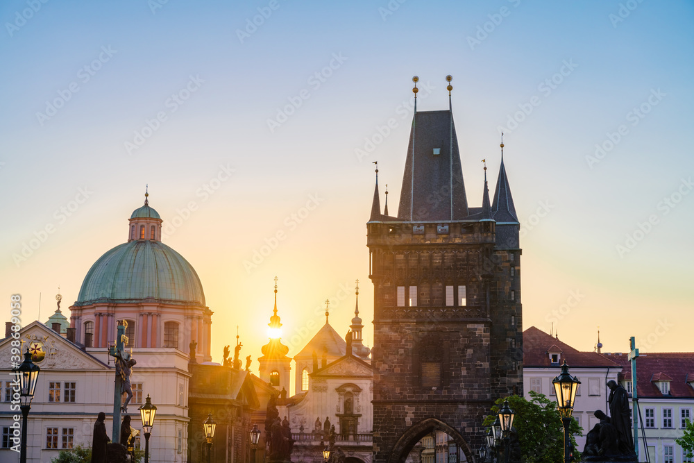 Naklejka premium Charles bridge tower at sunrise in Prague, Czech Republic
