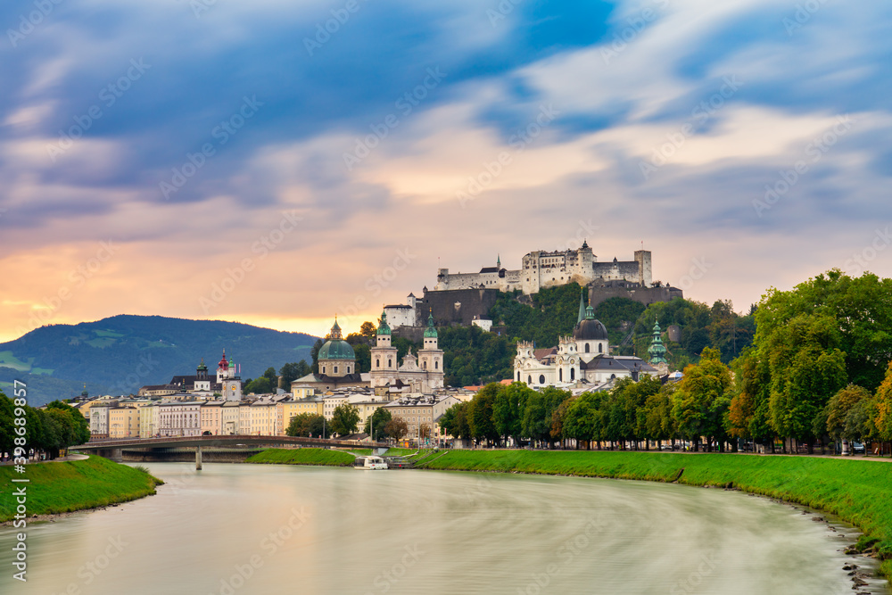 Salzburg skyline with Festung Hohensalzburg fortress at sunrise. Austria