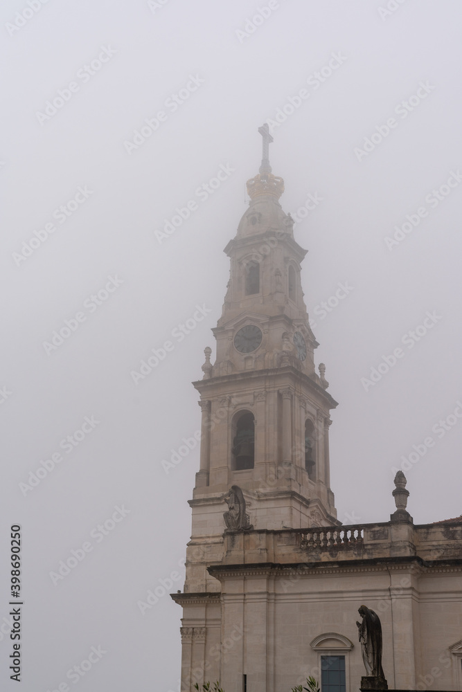view of the sanctuary of Our Lady of Fatima in Portugal on a foggy day