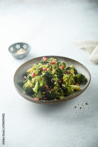 Broccoli with pomegranate seeds
