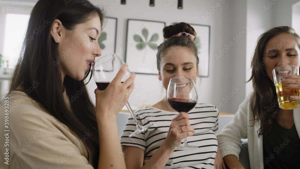 Video of three friends spending time together at home. Shot with RED helium camera in 8K Video of three friends spending time together at home. Shot with RED helium camera in 8K
