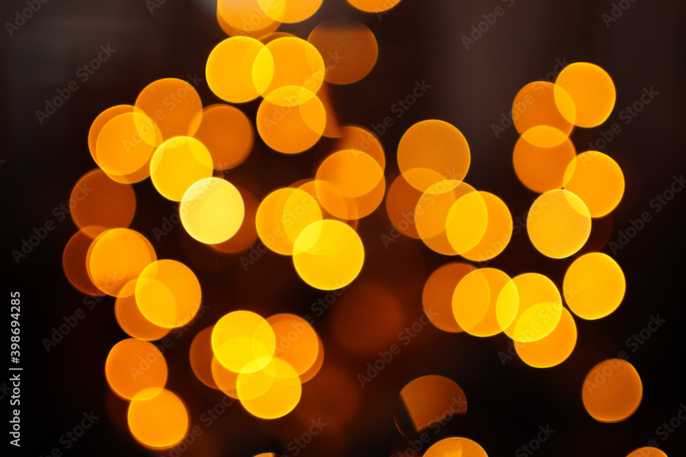 Bokeh. garland lights on a dark background. Christmas decoration. Bokeh. garland lights on a dark background. Christmas decoration.