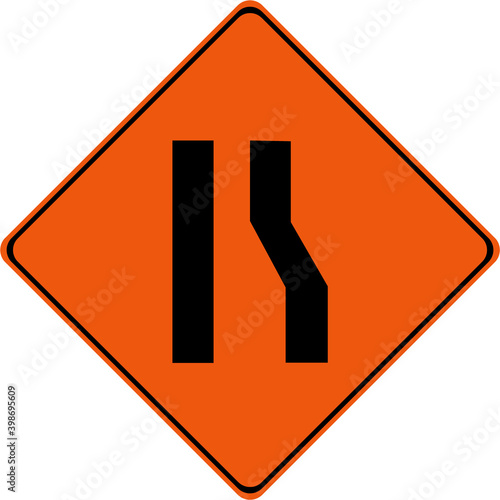 Warning sign with narrow road on right