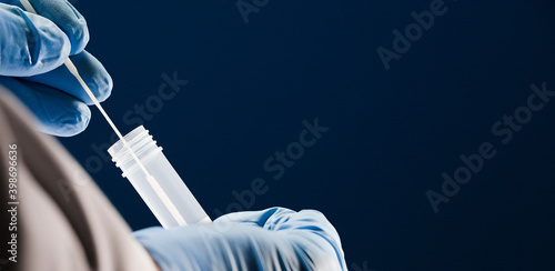 Transport of PCR virals in laboratory,  (obtaining analysis for results), in the hands of a doctor, with blue background