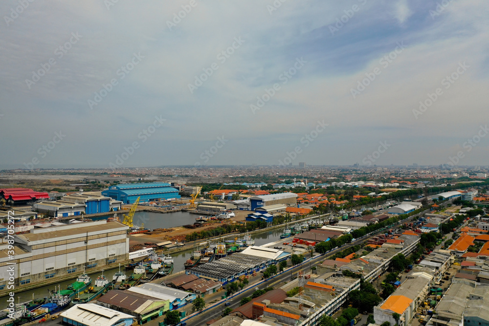 aerial view cargo and passenger seaport with ships and crane Tanjung Perak, surabaya, indonesia. docks for the repair and parking of ships, cargo port and container terminal. ship in industrial port