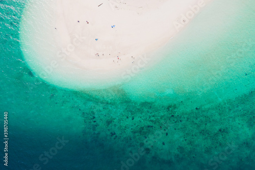 Aerial view Nature sea. Turquoise Sea and White beach sand in copy space, Aerial view of drone, Seawater clear and blue green. Nature in Khai Island. At Khai island, Phuket, Thailand. Travel concept.