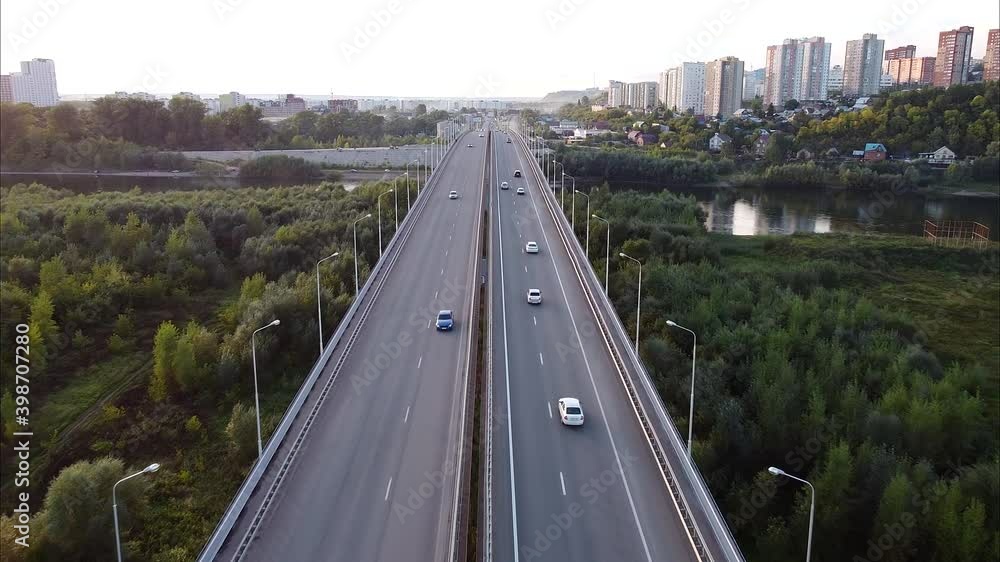 aerial photography of the road, bridge, highway, cars driving on the road shooting from a height. aerial photography of the road, bridge, highway, cars driving on the road shooting from a height.